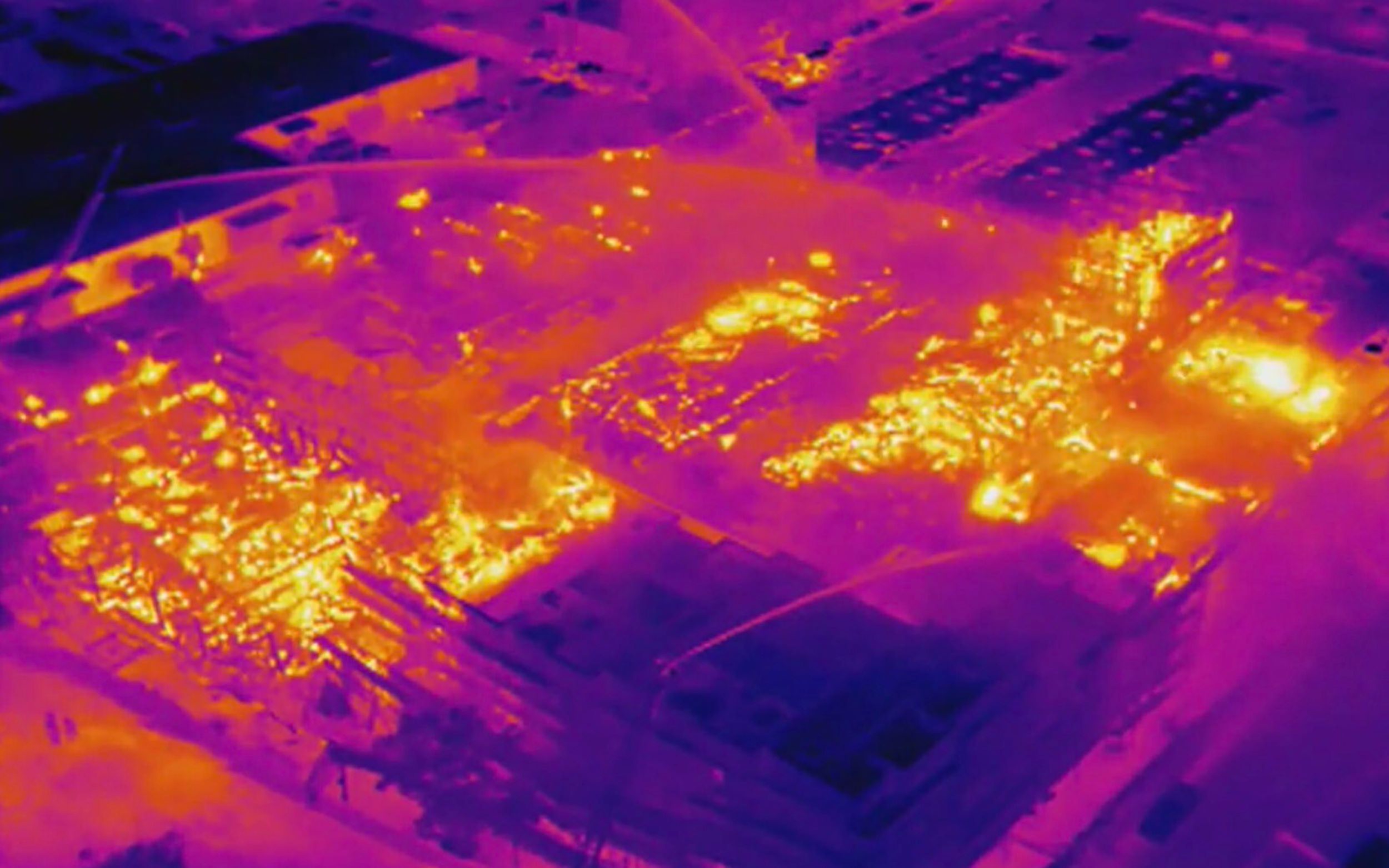 Drone with thermal camera shows hot spots in massive fire in Oakland, Calif